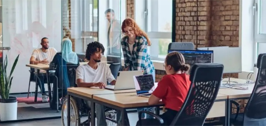 a group of people in a meeting