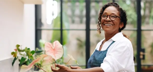 a woman holding a flower