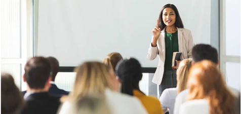 a person standing in front of a group of people