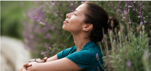 a person lying in a field